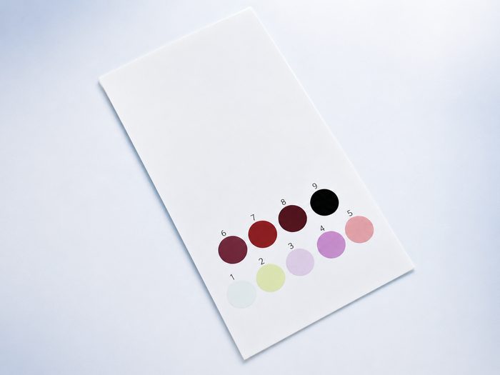 CCI REAGENT color reference card with 9 numbered result swatches